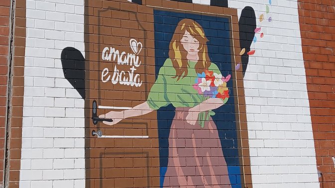 Murale "Amami e basta"